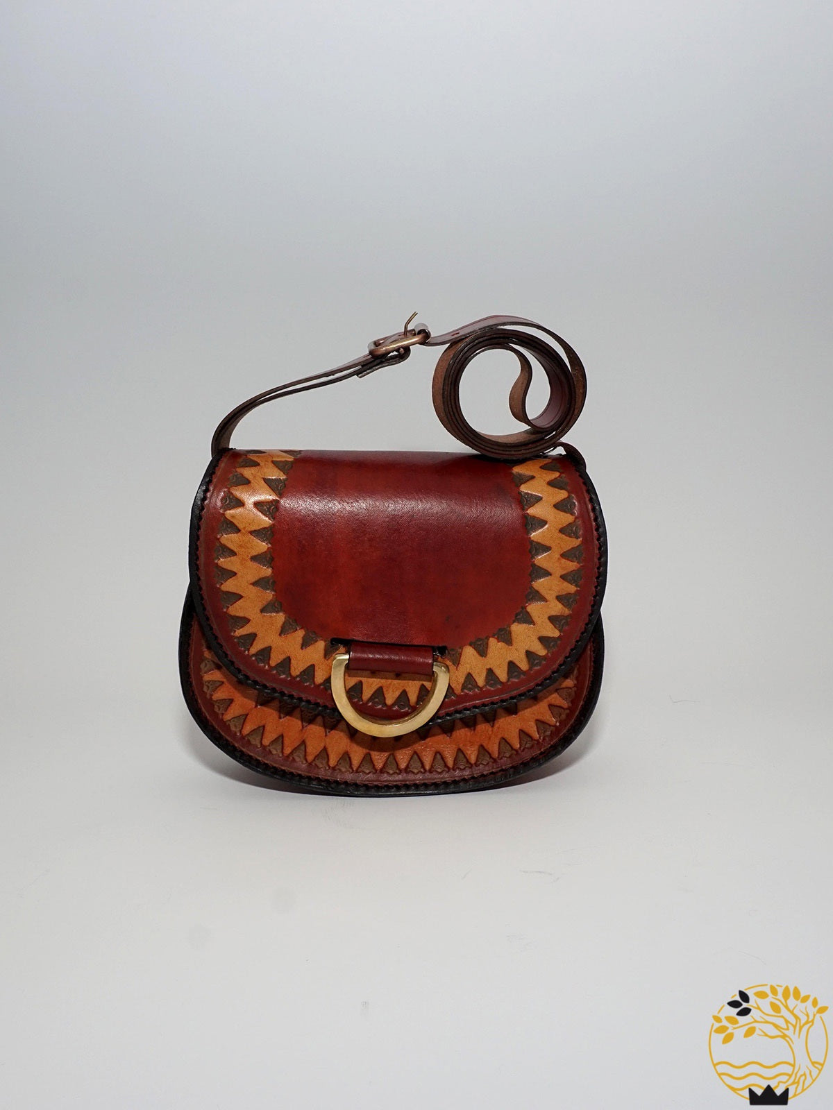 Braune Tasche aus Rindsleder mit Musterung