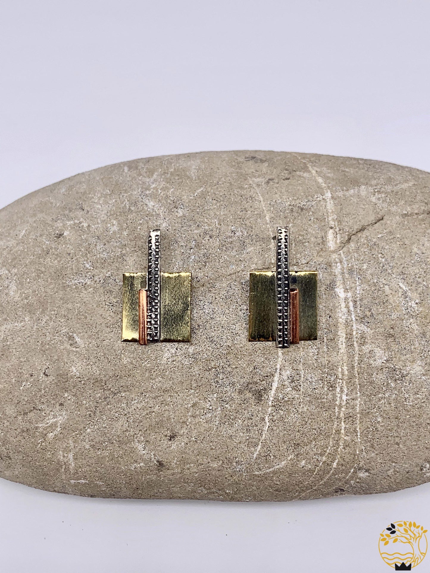 quadratische Ohrstecker in verschiedenen metallen